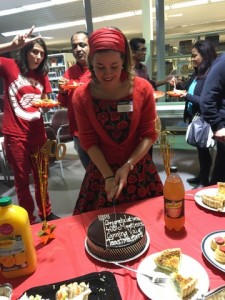 President Vanessa performs her last duties by cutting the 400th meeting cake